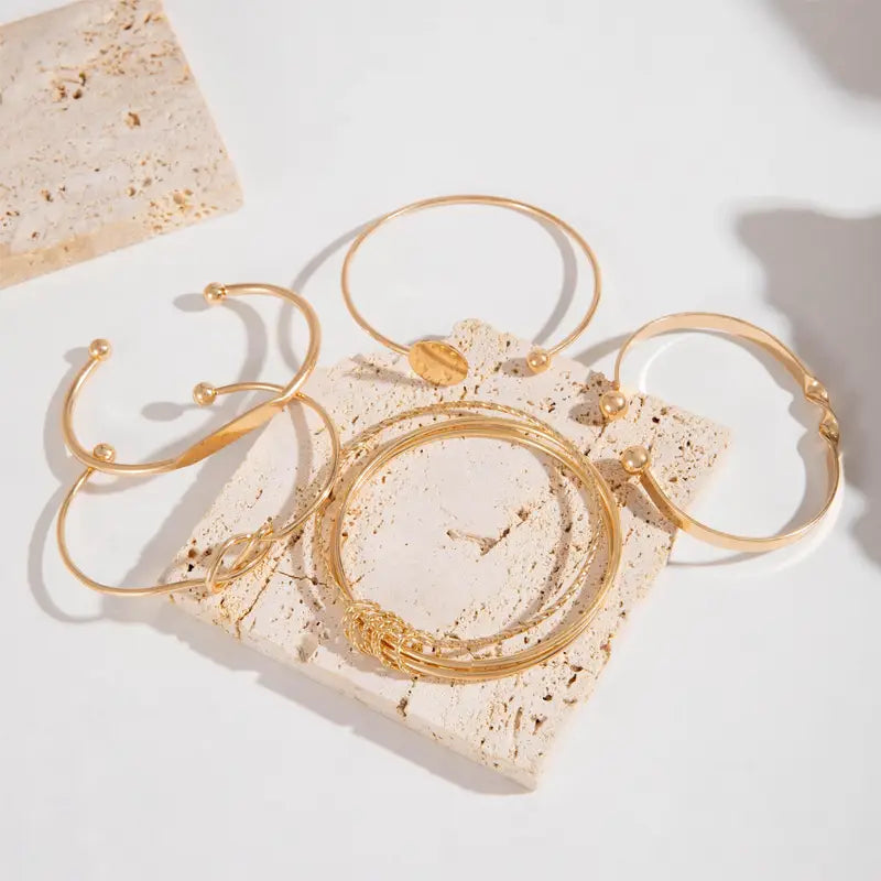 Set di bracciali Knotted Elegance | Oro