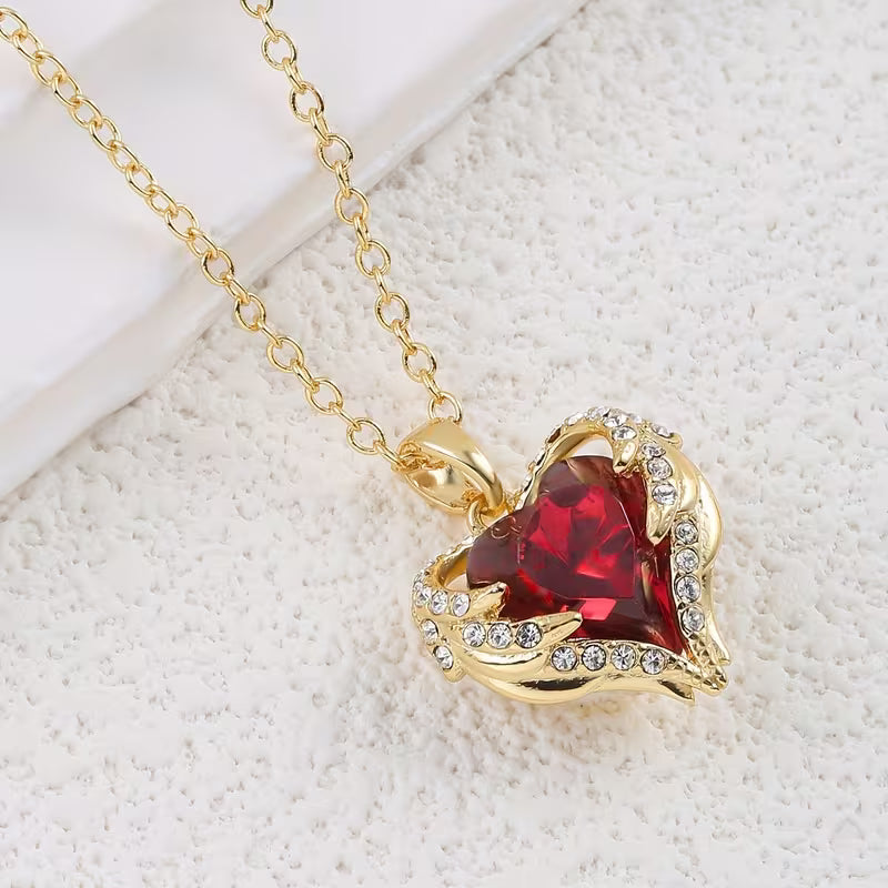 Collana con cuore di rubino Angel Embrace | Oro