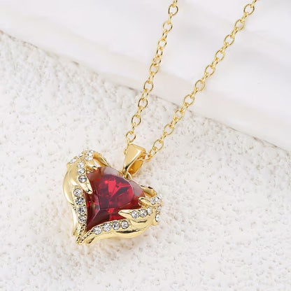 Collana con cuore di rubino Angel Embrace | Oro