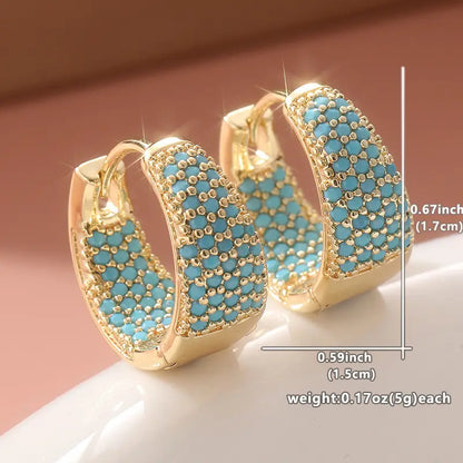 Orecchini a cerchio con perline color turchese e finitura dorata | Oro