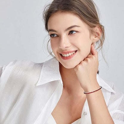 Bracciale tennis con rubini | Oro bianco