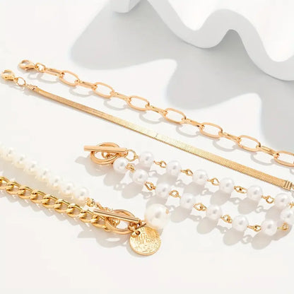 Set di 4 bracciali Chic Gold - Serpente, perle e catene | Oro