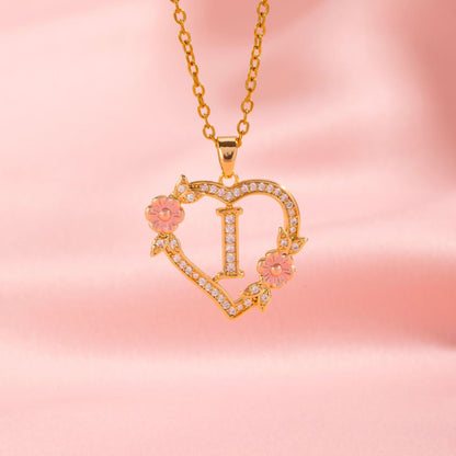 Collana con iniziale e charm floreale | Oro