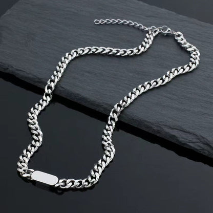 Collana con targhetta e catena cubana | Oro bianco