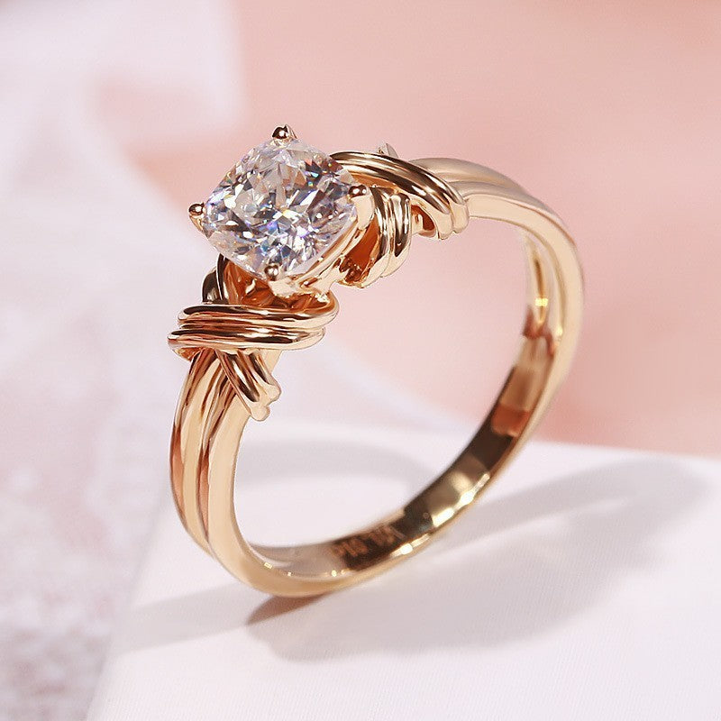 Anello a fascia con nodo | Oro