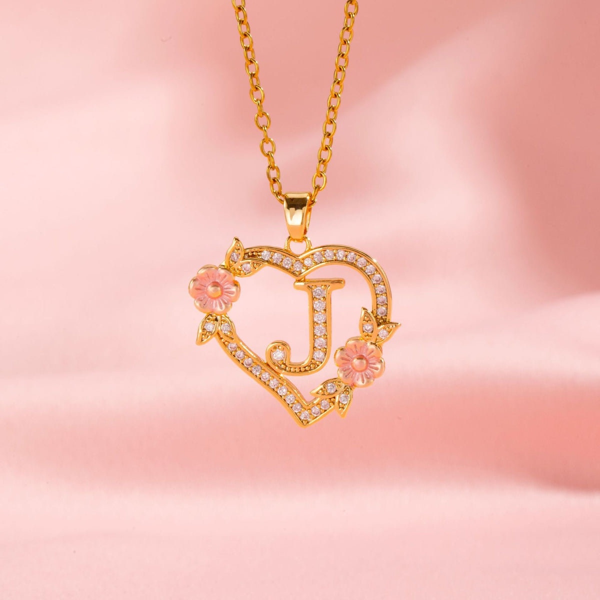 Collana con iniziale e charm floreale | Oro