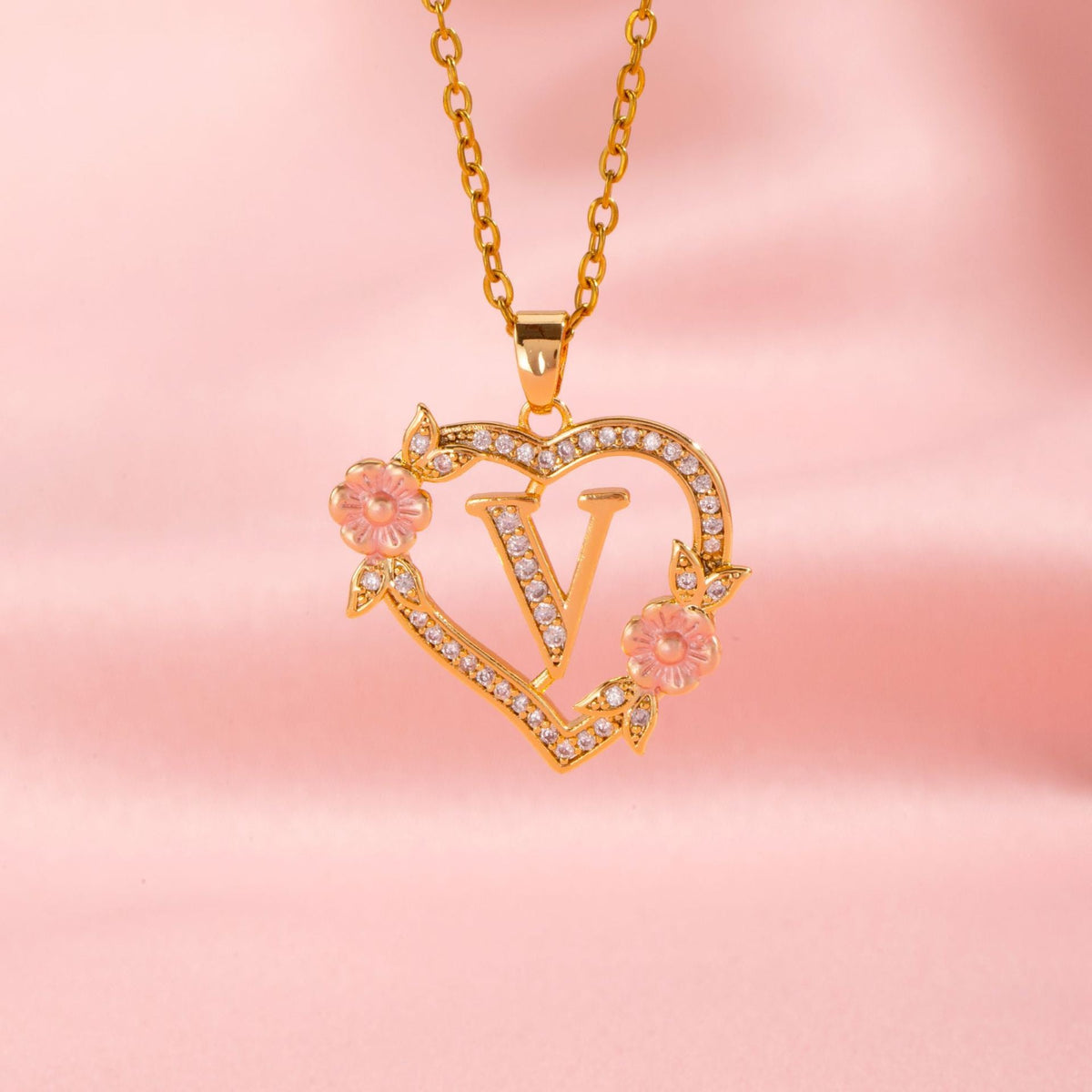 Collana con iniziale e charm floreale | Oro