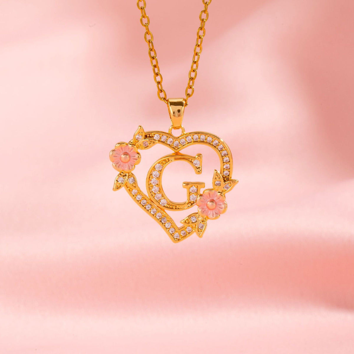 Collana con iniziale e charm floreale | Oro