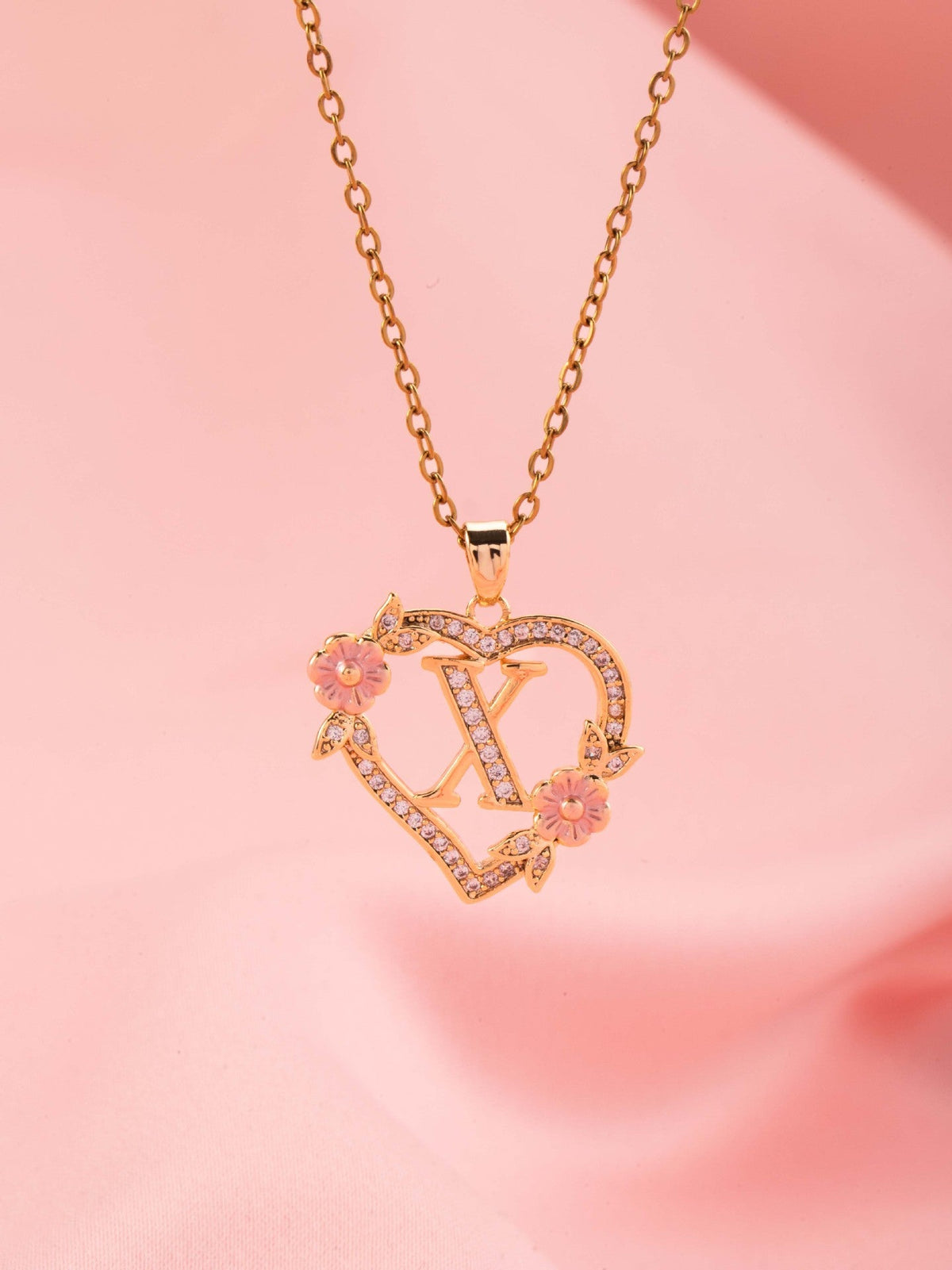 Collana con iniziale e charm floreale | Oro