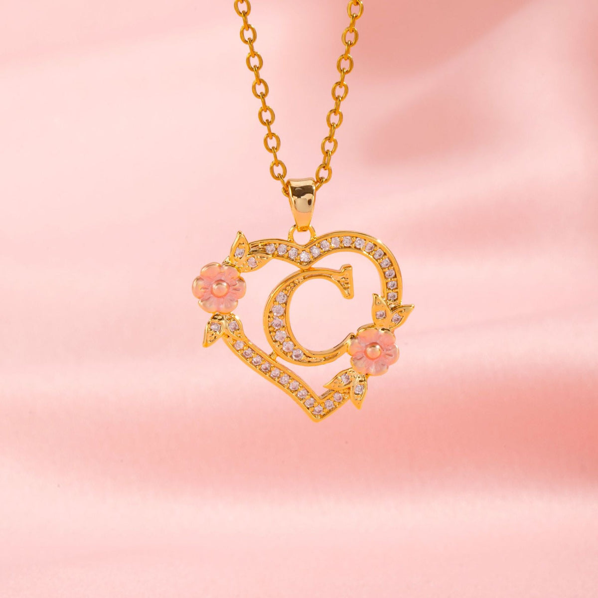 Collana con iniziale e charm floreale | Oro