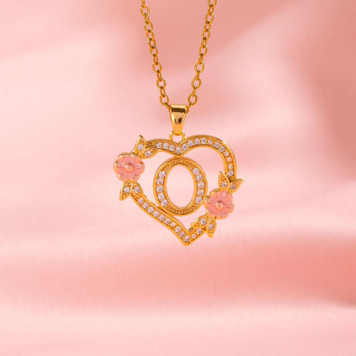 Collana con iniziale e charm floreale | Oro