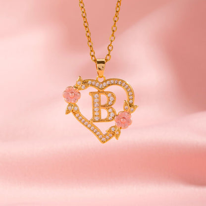 Collana con iniziale e charm floreale | Oro