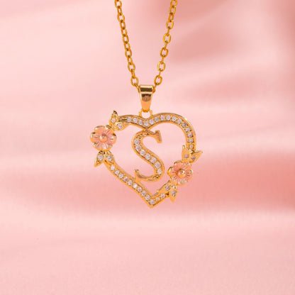Collana con iniziale e charm floreale | Oro
