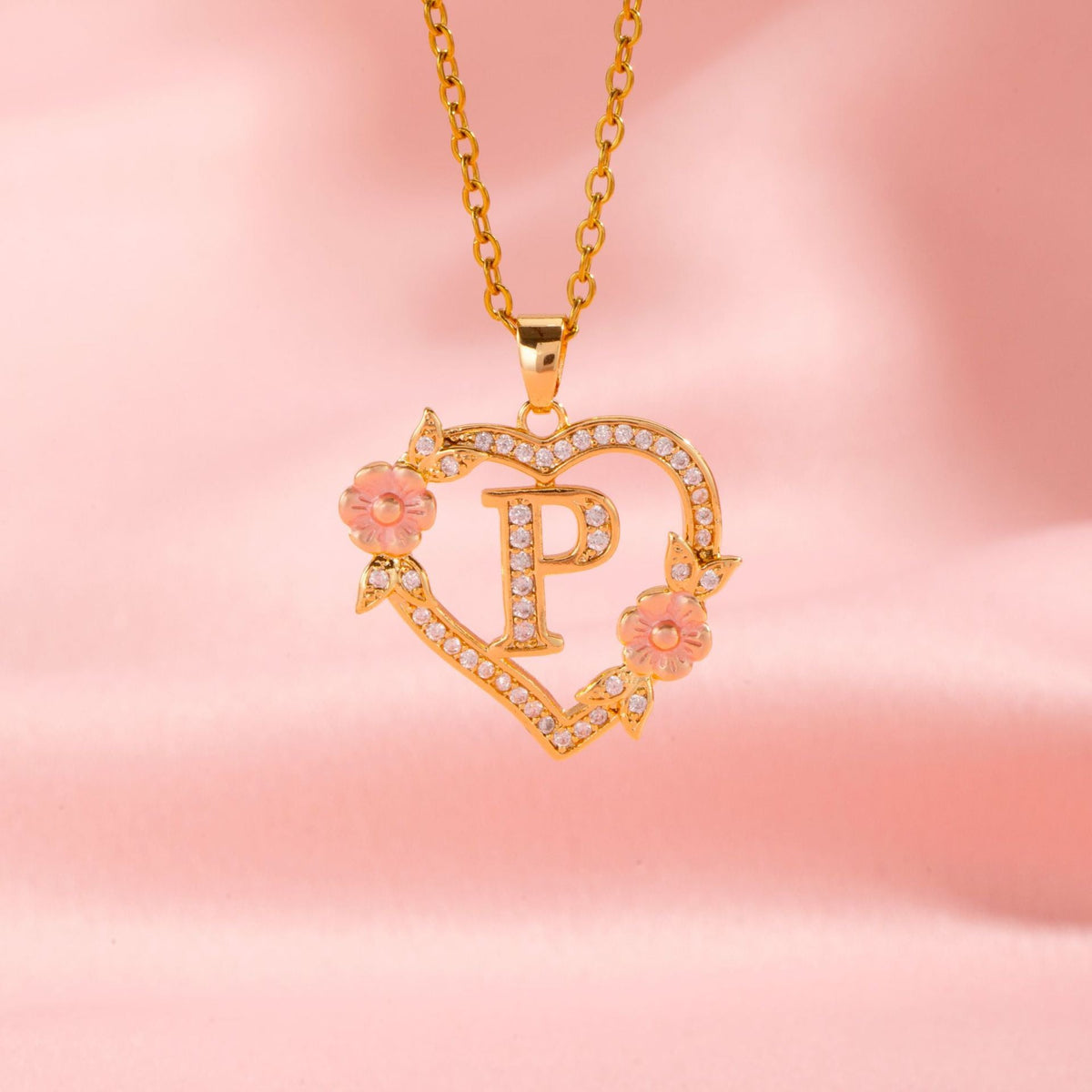 Collana con iniziale e charm floreale | Oro