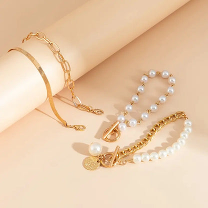 Set di 4 bracciali Chic Gold - Serpente, perle e catene | Oro