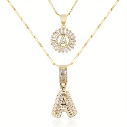 Set di collane con iniziale pavé | Oro
