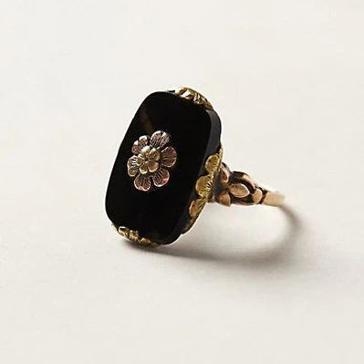 Anello vintage con pietra nera | Oro