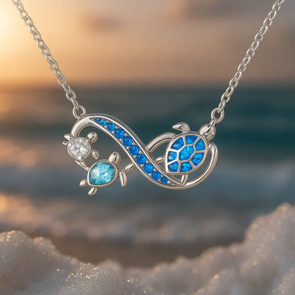Collana con due tartarughe in argento | Oro bianco
