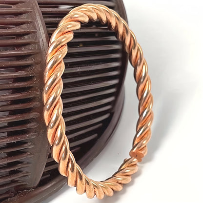 Bracciale intrecciato in rame Cordelia